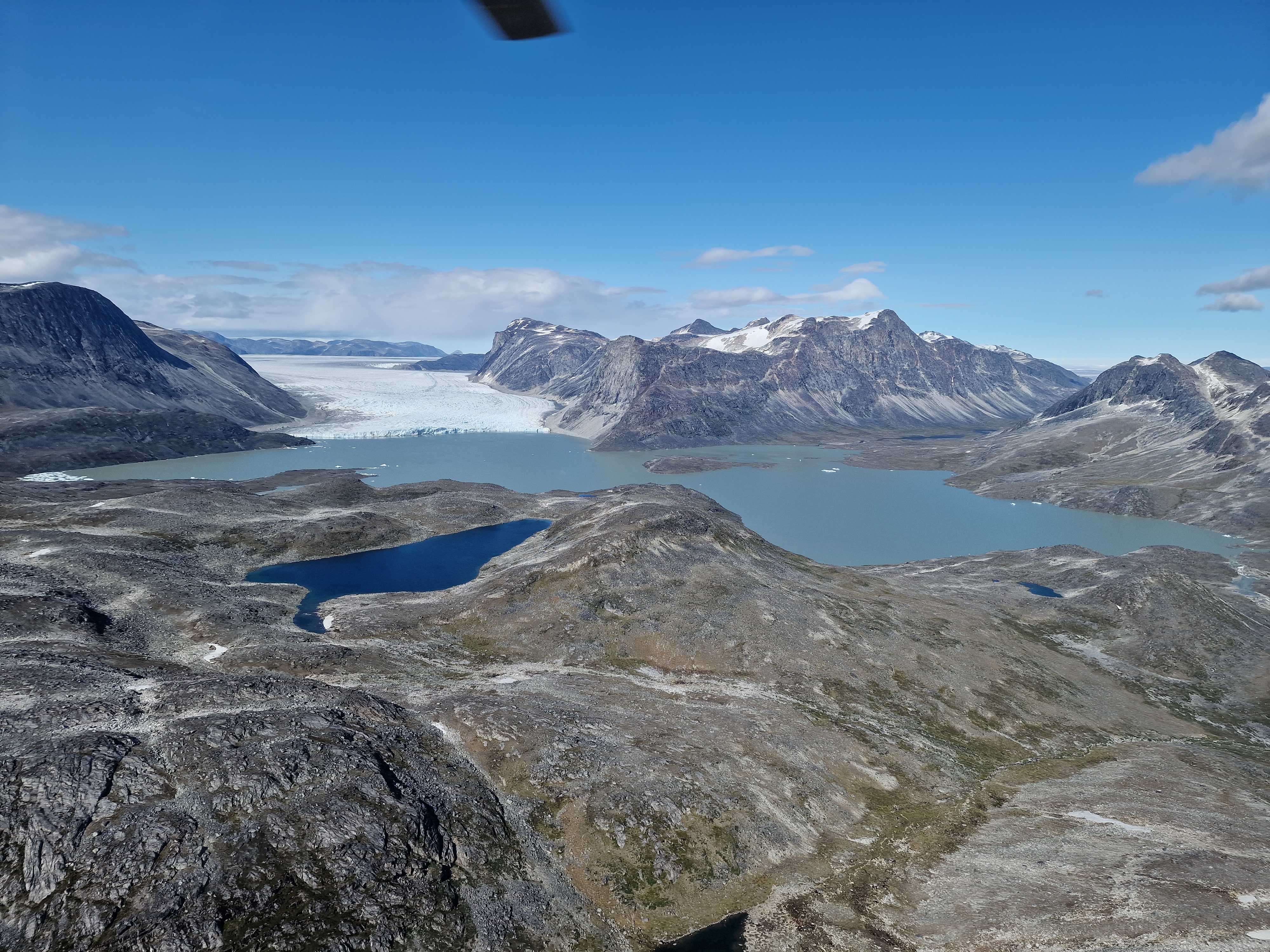 Typical Greenlandic landscape with mountains, glaciers and lakes